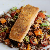 image of final product for cooking class - salmon on top of quinoa